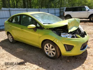 2012 Ford Fiesta SE z VIN 3FADP4BJ7CM164850, wystawiony jako Copart lot #51680925 z przebiegiem 184 884 mil mil oraz Szkoda całkowita • Salvage title. Historia ofert i sprzedaży dostępna na DreamBid. Obrazek 4.