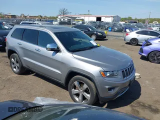 2014 Jeep Grand Cherokee Limited with VIN 1C4RJFBG7EC395138, listed as a IAAI auction lot 42117356 with 202,995 mi miles. Bid and sale history available at carsss.com. Image 1.