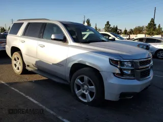 2020 Chevrolet Tahoe LS with VIN 1GNSCAKCXLR201067, listed as a Copart auction lot 78907264 with 122,630 mi miles and Salvage title. Bid and sale history available at DreamBid. Image 4.