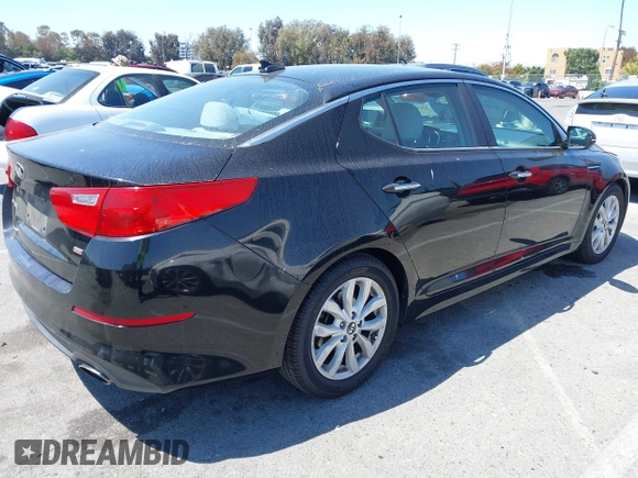 2015 Kia Optima LX with VIN KNAGM4A7XF5615069, listed as a IAAI auction lot 42234624 with 174,078 mi miles and . Bid and sale history available at DreamBid. Image 4.