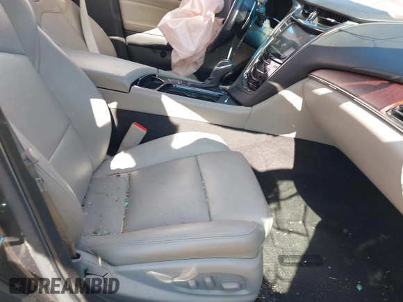 2016 Cadillac CTS Luxury Collection AWD with VIN 1G6AX5SX1G0113069, listed as a IAAI auction lot 41866529 with 54,929 mi miles and . Bid and sale history available at DreamBid. Image 5.