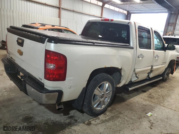 2012 Chevrolet Silverado 1500 LTZ with VIN 3GCPKTE77CG179797, listed as a Copart auction lot 45024975 with 162,008 mi miles and Salvage Title. Bid and sale history available at carsss.com. Image 3.
