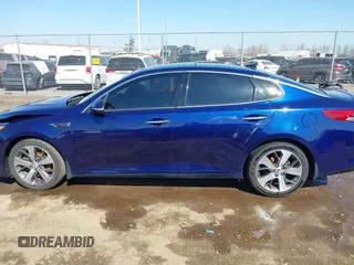 2019 Kia Optima LX with VIN 5XXGT4L35KG303814, listed as a IAAI auction lot 41769183 with 107,509 mi miles. Bid and sale history available at carsss.com. Image 14.