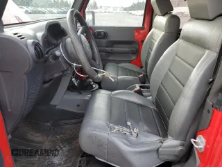 2009 Jeep Wrangler X with VIN 1J4FA24149L760959, listed as a Copart auction lot 49425955 with 128,813 mi miles and Salvage Title. Bid and sale history available at DreamBid. Image 7.