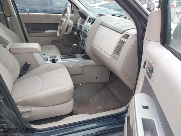 2010 Mercury Mariner with VIN 4M2CN8B77AKJ06310, listed as a IAAI auction lot 41650188 with 144,301 mi miles. Bid and sale history available at carsss.com. Image 5.