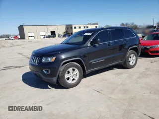 2014 Jeep Grand Cherokee Laredo with VIN 1C4RJEAGXEC217249, listed as a Copart auction lot 48585195 with 131,635 mi miles and Salvage Title. Bid and sale history available at DreamBid. Image 1.