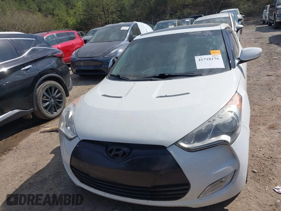 2014 Hyundai Veloster with VIN KMHTC6AD1EU217707, listed as a IAAI auction lot 41718176 with 191,306 mi miles. Bid and sale history available at carsss.com. Image 6.