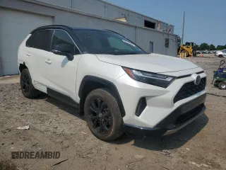2023 Toyota RAV4 Hybrid XSE with VIN JTME6RFV7PD542467, listed as a Copart auction lot 59144595 with 18,943 mi miles and Salvage title. Bid and sale history available at DreamBid. Image 4.