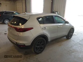 2020 Kia Sportage S with VIN KNDP6CAC3L7813464, listed as a IAAI auction lot 42128252 with 76,271 mi miles. Bid and sale history available at carsss.com. Image 4.