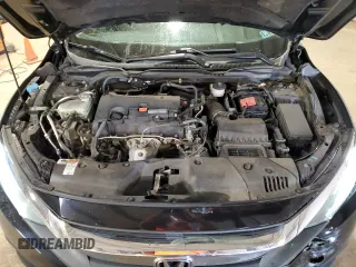 2018 Honda Civic LX with VIN 19XFC2F5XJE204085, listed as a Copart auction lot 51323935 with 164,201 mi miles and Salvage Title. Bid and sale history available at carsss.com. Image 11.