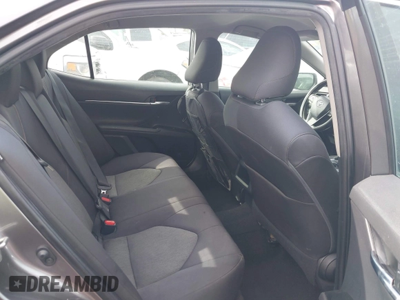 2019 Toyota Camry LE with VIN 4T1B11HK4KU254853, listed as a IAAI auction lot 42013255 with 153,664 mi miles and . Bid and sale history available at DreamBid. Image 8.