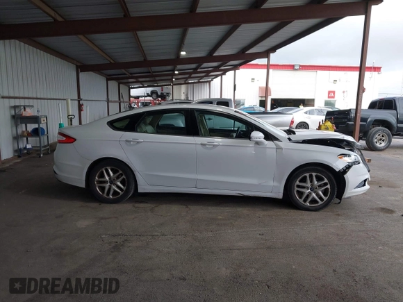 2016 Ford Fusion SE with VIN 3FA6P0H71GR386404, listed as a IAAI auction lot 41974062 with 104,018 mi miles. Bid and sale history available at carsss.com. Image 14.