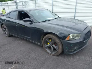 2013 Dodge Charger SE with VIN 2C3CDXBG9DH546130, listed as a IAAI auction lot 42209748 with 214,087 mi miles and . Bid and sale history available at carsss.com. Image 1.