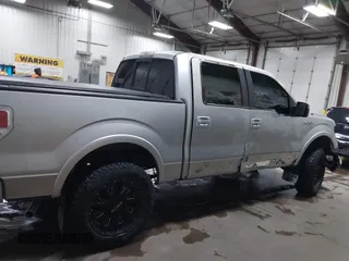 2011 Ford F-150 XL with VIN 1FTFW1EF7BFC77207, listed as a IAAI auction lot 41491587 with 168,207 mi miles. Bid and sale history available at carsss.com. Image 13.