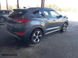 2018 Hyundai Tucson Value with VIN KM8J3CA20JU762120, listed as a IAAI auction lot 41878796 with 103,346 mi miles. Bid and sale history available at carsss.com. Image 4.