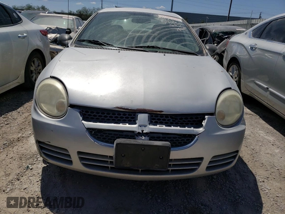 2005 Dodge Neon SXT z VIN 1B3ES56C65D162506, wystawiony jako Copart lot #57367005 z przebiegiem 125 391 mil mil oraz Szkoda całkowita • Salvage title. Historia ofert i sprzedaży dostępna na DreamBid. Obrazek 5.