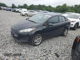 2019 Ford Fiesta SE z VIN 3FADP4BJ9KM151046, wystawiony jako Copart lot #56862255 z przebiegiem 77 002 mil mil oraz Tytuł czysty. Historia ofert i sprzedaży dostępna na DreamBid. Obrazek 1.