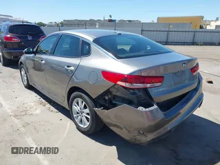 2016 Kia Optima LX with VIN 5XXGT4L36GG098804, listed as a IAAI auction lot 42772231 with 206,471 mi miles and . Bid and sale history available at DreamBid. Image 3.