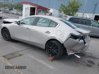 2024 Mazda 3 S Select Sport with VIN 3MZBPABM2RM422045, listed as a IAAI auction lot 42164274 with 4,926 mi miles and . Bid and sale history available at DreamBid. Image 3.