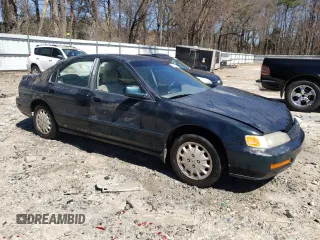 1997 Honda Accord EX with VIN 1HGCD5652VA034672, listed as a Copart auction lot 49098795 with 203,283 mi miles and Salvage Title. Bid and sale history available at DreamBid. Image 4.