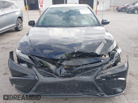 2021 Toyota Camry SE Nightshade with VIN 4T1G11AK2MU471174, listed as a IAAI auction lot 41740546 with 77,037 mi miles. Bid and sale history available at carsss.com. Image 6.