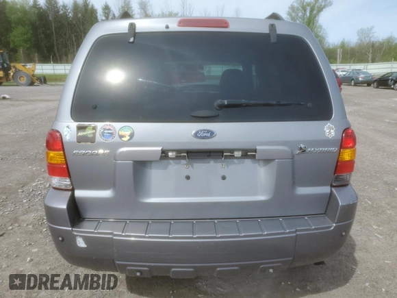2007 Ford Escape Hybrid with VIN 1FMCU49HX7KB43999, listed as a Copart auction lot 53320974 with 203,002 mi miles and Non Repairable. Bid and sale history available at carsss.com. Image 6.