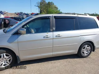 2005 Honda Odyssey EX-L z VIN 5FNRL38715B014905, wystawiony jako IAAI lot #41986395 z przebiegiem 191 029 mil mil oraz . Historia ofert i sprzedaży dostępna na DreamBid. Obrazek 18.