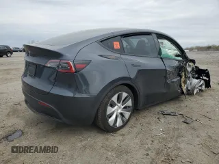 2024 Tesla Model Y с VIN 7SAYGDED1RF092027, выставлен на аукционе Copart как лот 51655485 с пробегом 22 010 миль миль и Списание • Salvage title. История ставок и продаж доступна на DreamBid. Изображение 3.