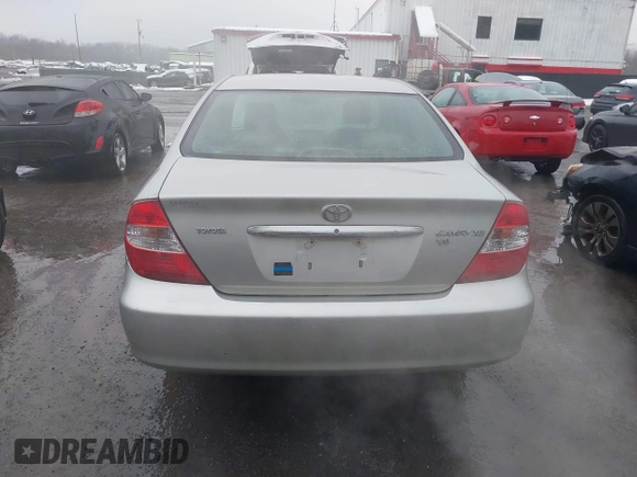 2004 Toyota Camry LE with VIN 4T1BF30K14U578385, listed as a IAAI auction lot 41547709 with 217,434 mi miles. Bid and sale history available at carsss.com. Image 16.