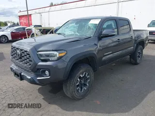2020 Toyota Tacoma SR5 with VIN 3TMCZ5AN7LM321061, listed as a IAAI auction lot 41985533 with 32,111 mi miles and . Bid and sale history available at DreamBid. Image 18.