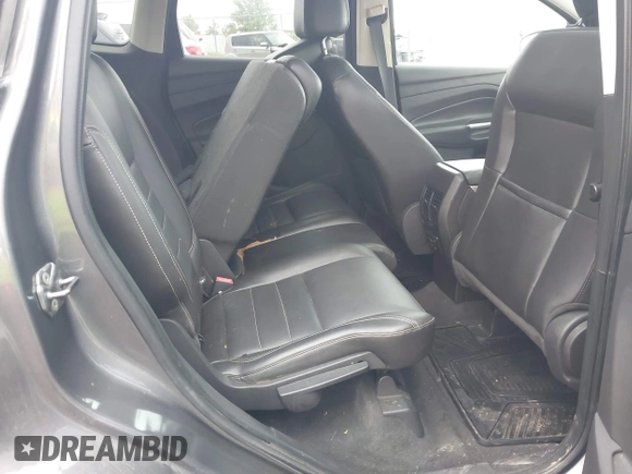 2013 Ford Escape SEL with VIN 1FMCU9HX4DUC75565, listed as a IAAI auction lot 42574351 with 180,876 mi miles and . Bid and sale history available at DreamBid. Image 8.