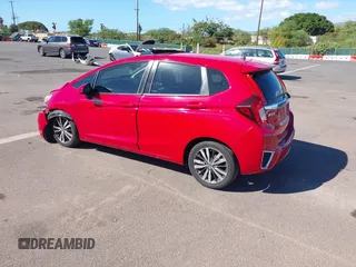 2015 Honda Fit EX-L z VIN 3HGGK5H84FM761279, wystawiony jako IAAI lot #40911141 z przebiegiem 82 217 mil mil oraz . Historia ofert i sprzedaży dostępna na DreamBid. Obrazek 3.