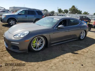 2014 Porsche Panamera S E-Hybrid with VIN WP0AD2A78EL044818, listed as a Copart auction lot 65864484 with 141,423 mi miles and Salvage Title. Bid and sale history available at DreamBid. Image 1.