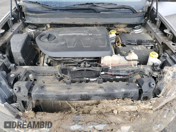2019 Jeep Cherokee Trailhawk with VIN 1C4PJMBX8KD314746, listed as a Copart auction lot 51801135 with 124,281 mi miles and Salvage title. Bid and sale history available at DreamBid. Image 12.