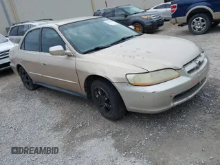 2002 Honda Accord EX z VIN 1HGCG56532A061902, wystawiony jako IAAI lot #41916901 z przebiegiem 159 766 mil mil oraz . Historia ofert i sprzedaży dostępna na DreamBid. Obrazek 1.