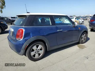 2014 MINI Hardtop with VIN WMWXM5C52ET932677, listed as a Copart auction lot 53486865 with 189,039 mi miles and Salvage title. Bid and sale history available at DreamBid. Image 3.