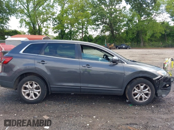2015 Mazda CX-9 Sport с VIN JM3TB2BA7F0465822, выставлен на аукционе IAAI как лот 42270131 с пробегом 123 483 миль миль и . История ставок и продаж доступна на DreamBid. Изображение 13.