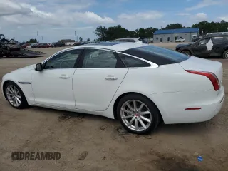 2015 Jaguar XJ with VIN SAJWA1CZ9F8V82974, listed as a Copart auction lot 59364344 with 64,012 mi miles and Salvage Title. Bid and sale history available at carsss.com. Image 2.