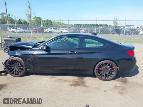 2015 BMW 4 Series 428i xDrive with VIN WBA3N9C59FK248249, listed as a IAAI auction lot 42140141 with 106,916 mi miles and . Bid and sale history available at DreamBid. Image 14.
