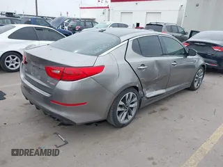 2014 Kia Optima SXL Turbo with VIN 5XXGR4A69EG312273, listed as a IAAI auction lot 41729863 with 107,660 mi miles and . Bid and sale history available at DreamBid. Image 4.