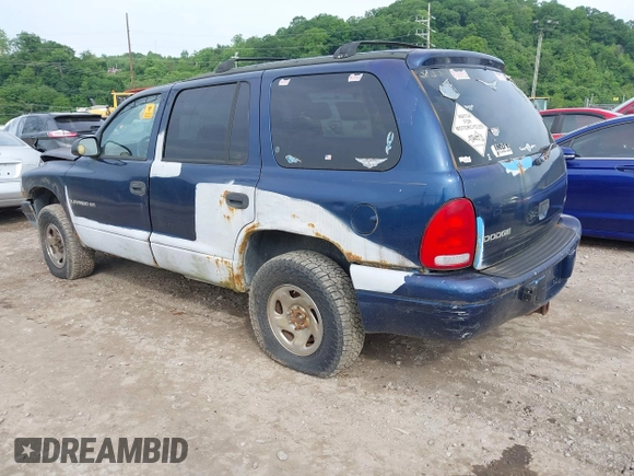 1999 Dodge Durango z VIN 1B4HS28Y0XF665181, wystawiony jako IAAI lot #42381349 z przebiegiem Nie podano mil oraz . Historia ofert i sprzedaży dostępna na DreamBid. Obrazek 3.