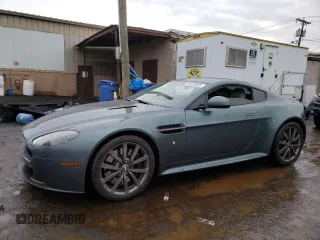 2015 Aston Martin V8 Vantage GT with VIN SCFEKBAL2FGC19020, listed as a Copart auction lot 46138035 with 34,752 mi miles and Salvage Title. Bid and sale history available at carsss.com. Image 1.
