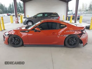 2015 Scion FR-S with VIN JF1ZNAA17F8703357, listed as a IAAI auction lot 41924644 with 62,023 mi miles. Bid and sale history available at carsss.com. Image 14.