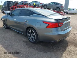 2016 Nissan Maxima SL z VIN 1N4AA6AP3GC392390, wystawiony jako IAAI lot #42260676 z przebiegiem 135 259 mil mil oraz . Historia ofert i sprzedaży dostępna na DreamBid. Obrazek 3.