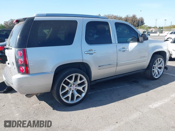 2011 GMC Yukon Denali with VIN 1GKS2EEF3BR350688, listed as a IAAI auction lot 41993776 with 241,941 mi miles. Bid and sale history available at carsss.com. Image 4.