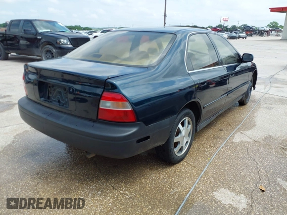 1994 Honda Accord EX with VIN 1HGCD5654RA042441, listed as a IAAI auction lot 42129570 with 121,220 mi miles and . Bid and sale history available at carsss.com. Image 4.