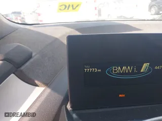2017 BMW i3 with VIN WBY1Z8C32HV891355, listed as a IAAI auction lot 41723555 with 77,773 mi miles. Bid and sale history available at carsss.com. Image 7.
