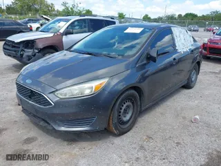 2016 Ford Focus S with VIN 1FADP3E26GL397348, listed as a IAAI auction lot 41952355 with 187,263 mi miles. Bid and sale history available at carsss.com. Image 2.