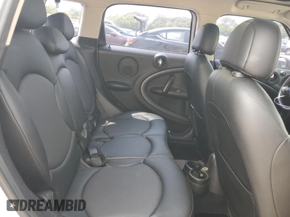 2015 MINI Countryman S with VIN WMWZC3C55FWT03267, listed as a Copart auction lot 59331605 with 116,964 mi miles and Salvage title. Bid and sale history available at DreamBid. Image 10.