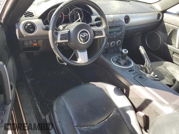 2010 Mazda MX-5 Miata Grand Touring with VIN JM1NC2FFXA0206089, listed as a Copart auction lot 76752674 with 212,584 mi miles and Salvage title. Bid and sale history available at DreamBid. Image 8.